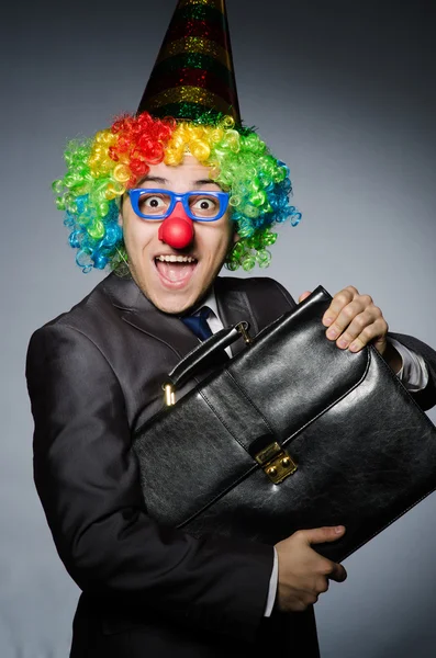 Clown homme d'affaires dans le concept drôle — Photo