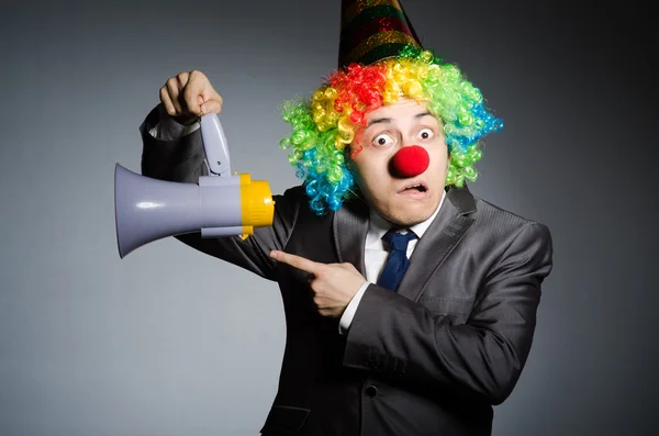 Clown med högtalare i roligt koncept — Stockfoto