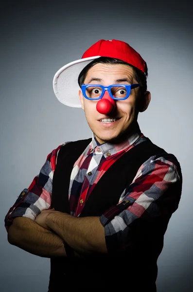 Funny clown against the dark background — Stock Photo, Image