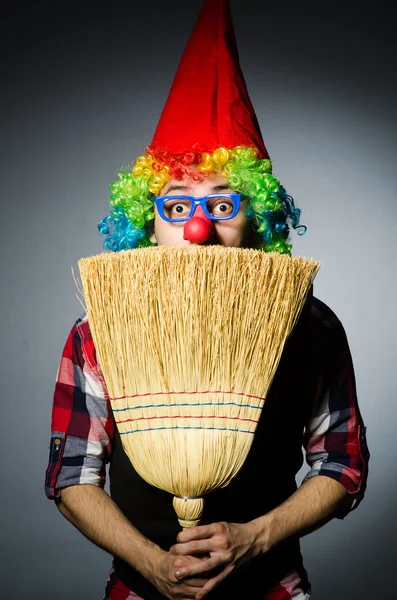 Funny clown with the broom — Stock Photo, Image