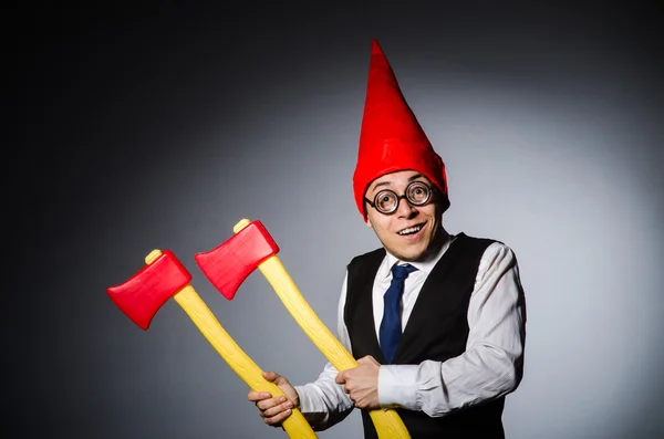 Man with axes in funny concept — Stock Photo, Image