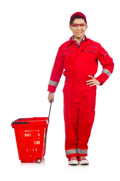 Man in red coveralls with shopping supermarket cart trolley — Stock Photo, Image