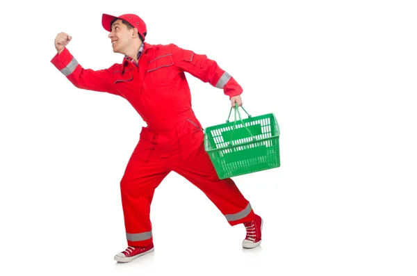 Man in red coveralls with shopping supermarket cart trolley — Stock Photo, Image