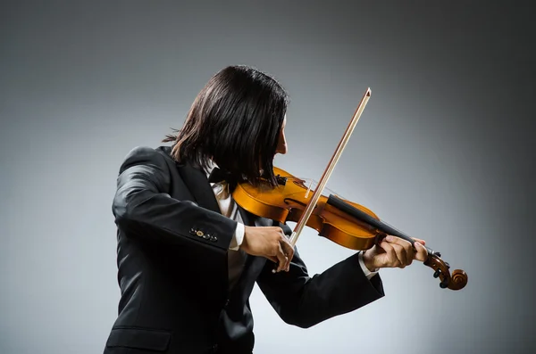 Man vioolspeler in muzikaal concept — Stockfoto