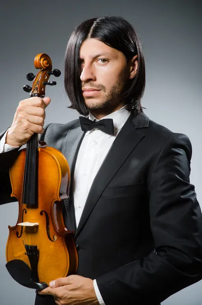 Homem violino no conceito musicano — Fotografia de Stock