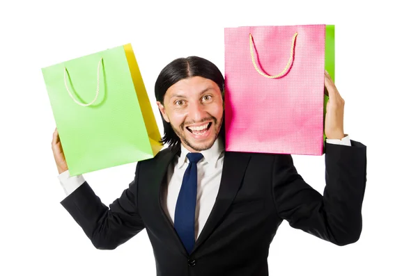 Man with shopping bags isolated on white — Stock Photo, Image