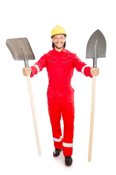 Hombre en mono rojo con pala — Foto de Stock