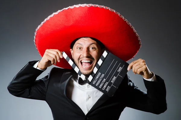 Mexicanske mand med film bord clapboard - Stock-foto