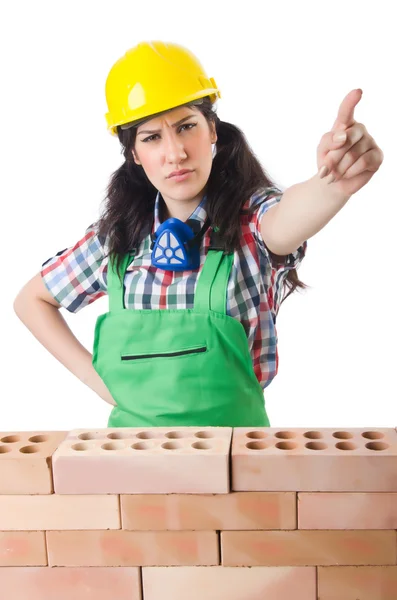 Woman builder isolated on the white — Stock Photo, Image