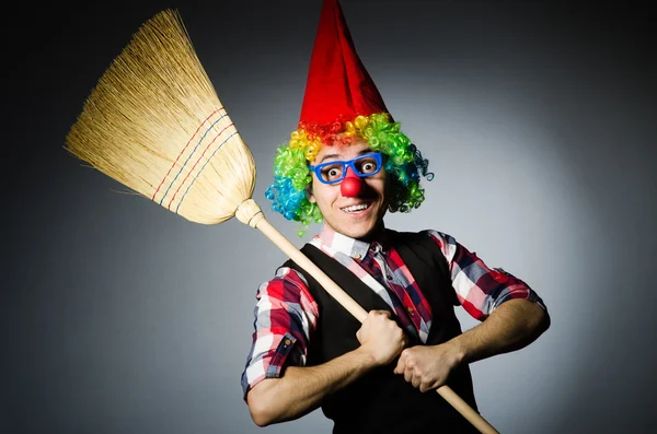 Funny clown with the broom — Stock Photo, Image