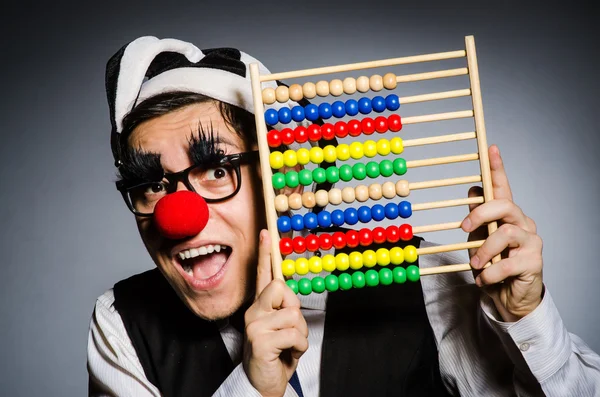 Clown divertente con abaco nel concetto di contabilità — Foto Stock