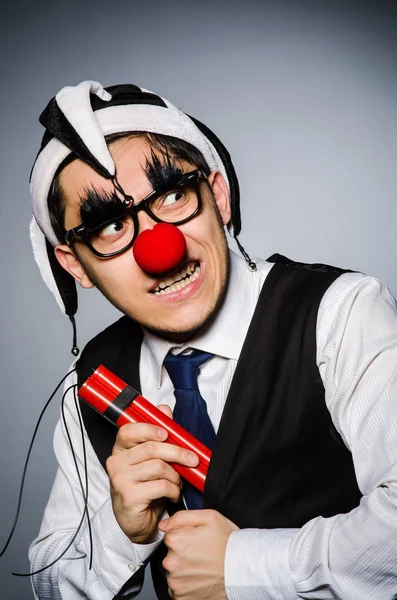 Funny clown with sticks of dynamite — Stock Photo, Image