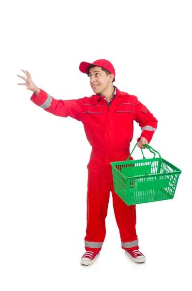 Man in red coveralls with shopping supermarket cart trolley — Stock Photo, Image