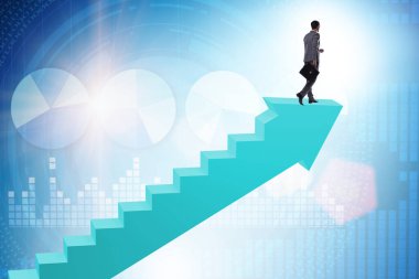 İş adamı iş dünyasında kariyer basamaklarını tırmanıyor