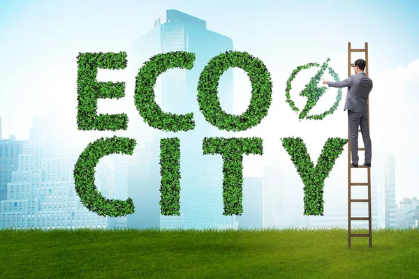 Eco ciudad en concepto de ecología con empresario — Foto de Stock