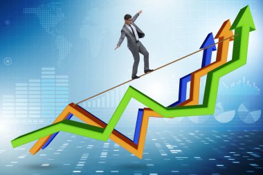 İş adamı çizelgede ip üzerinde denge kuruyor