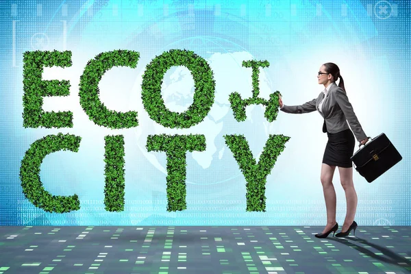 Eco city in ecology concept with businesswoman — Stock Photo, Image