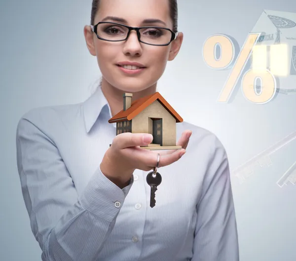 Businesswoman in real estate mortgage concept — Stock Photo, Image