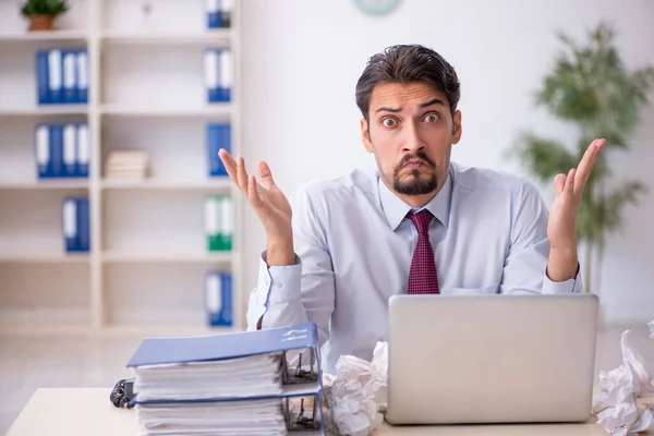 Young male employee in rejected ideas concept — Stock Photo, Image