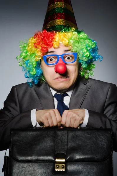 Clown homme d'affaires dans le concept drôle — Photo