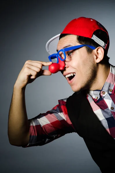 Funny clown against the dark background — Stock Photo, Image