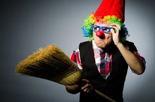 Funny clown with the broom — Stock Photo, Image