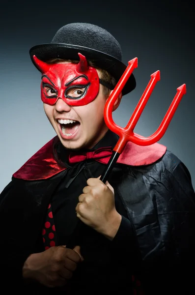 Funny devil against dark background — Stock Photo, Image