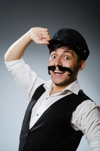 Funny taxi driver wearing peaked cap — Stock Photo, Image