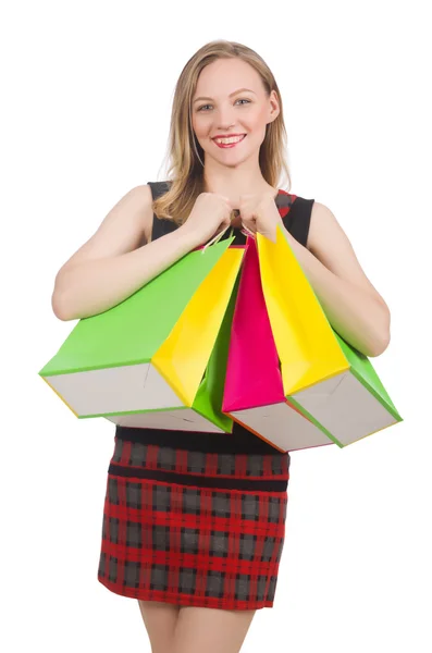Vrouw na het winkelen op wit — Stockfoto
