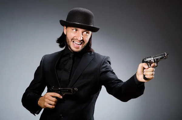 Człowiek ubrany kapelusz vintage z pistoletu — Zdjęcie stockowe