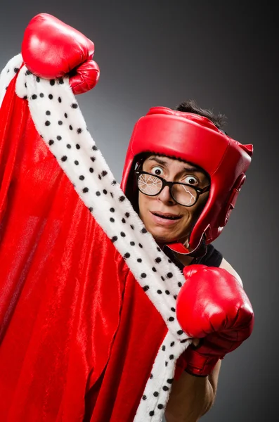黑黑的背景下戴着红色手套的滑稽拳击手 — 图库照片