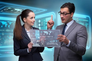 Pair of businessman and businesswoman discussing data clipart