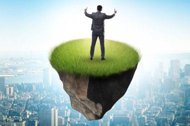 Yüzen adada iş adamı konsepti