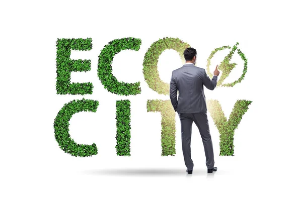 Eco city in ecology concept with businessman — Stock Photo, Image