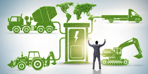 Empresario en el concepto de carga eléctrica y vehículos — Foto de Stock