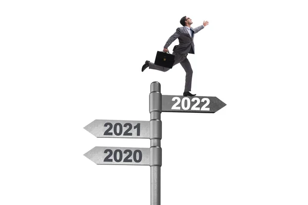 Businessman on the signpost from 2021 to 2022 — Stock Photo, Image