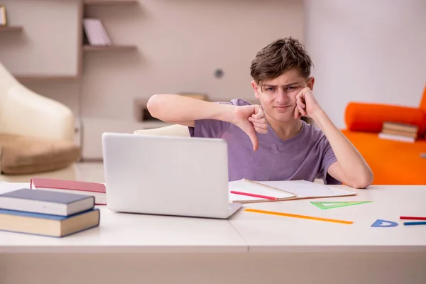 Schoolboy preparing for exams at home — Stock Photo, Image