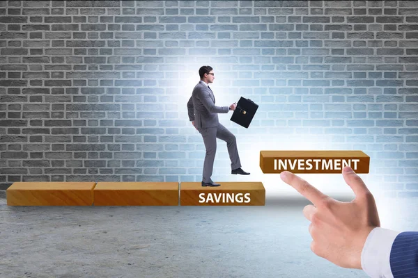 Concept of savings and investment with businessman — Stock Photo, Image