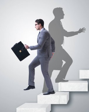 İş adamı ve iş konseptindeki gölgesi