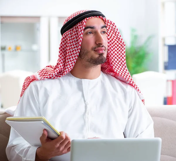 Arab man working at home on his work — Stock Photo, Image