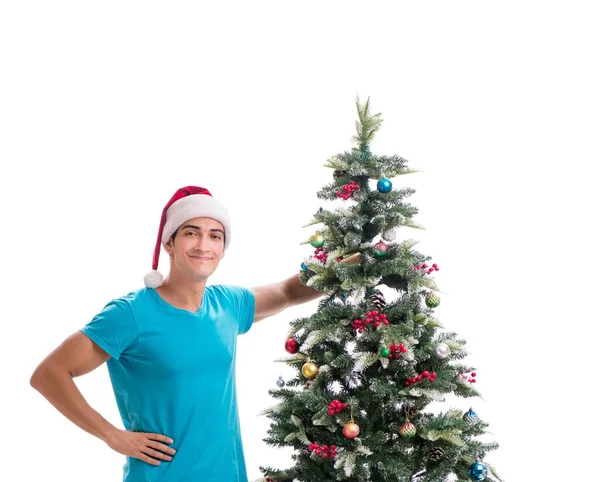 Jovem decorando árvore de Natal isolado em branco — Fotografia de Stock