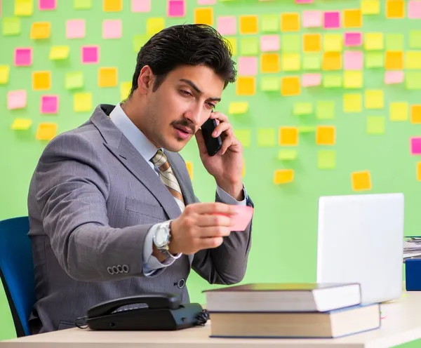 Businessman with many conflicting priorities — Stock Photo, Image