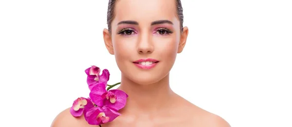 Hermosa mujer con flor de orquídea aislada en blanco — Foto de Stock