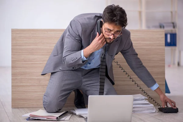 Young male employee working overtime in the office — Stock Photo, Image