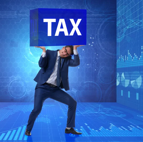 Man under the burden of tax payments — Stock Photo, Image