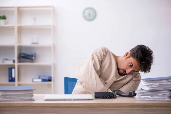 Crazy young man in straitjacket at the office — Stock Photo, Image