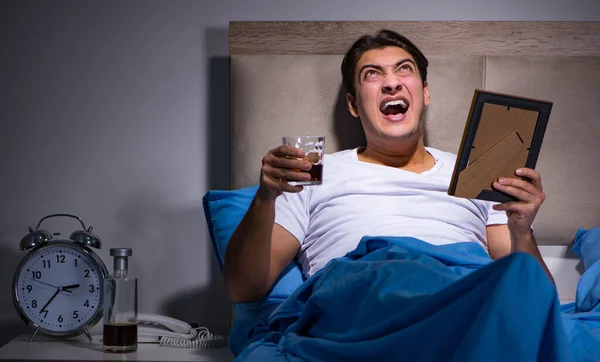 Desperate man divorced in bed — Stock Photo, Image