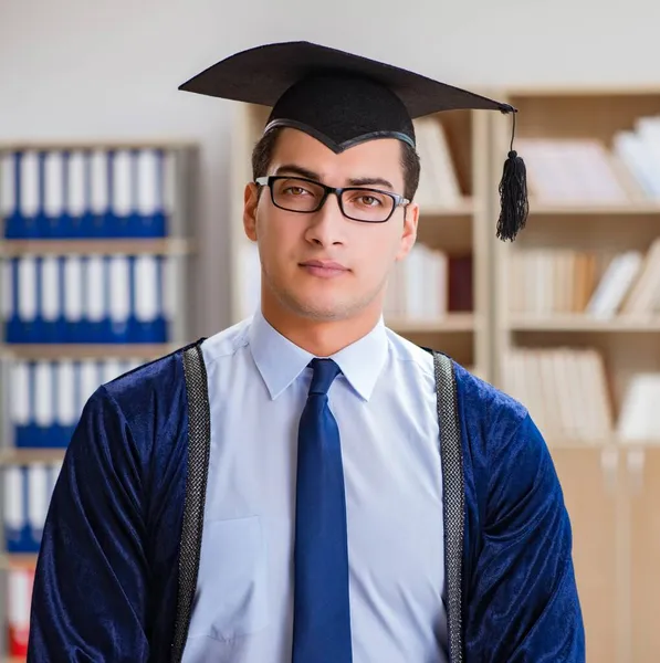 Young man graduating from university — Stock Photo, Image