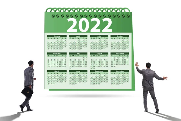 Empresário no conceito de calendário do ano 2022 — Fotografia de Stock