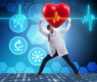 Kardiyogram kalp çizgisini destekleyen doktor.